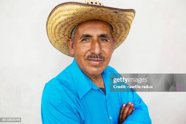 a mexican man with personality - straw hat stock pictures, royalty-free photos & images
