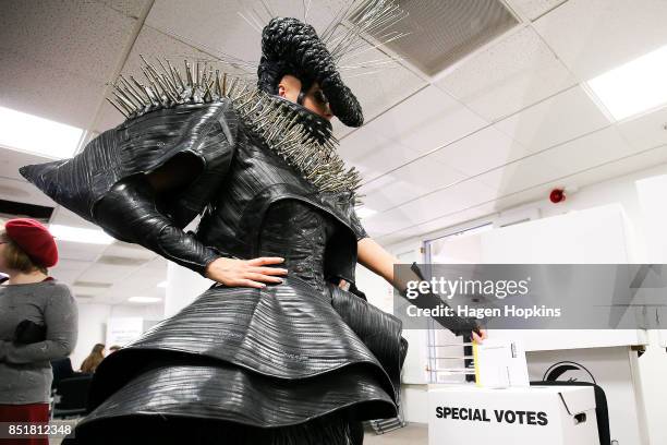 Emma Martin, dressed in World of WearableArt garment 'Refuse Refuge' by Grace DuVal of the United States, votes at Wellington City Library on...