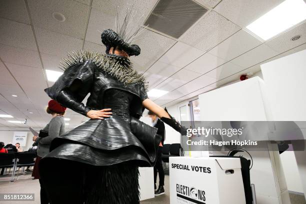 Emma Martin, dressed in World of WearableArt garment 'Refuse Refuge' by Grace DuVal of the United States, votes at Wellington City Library on...