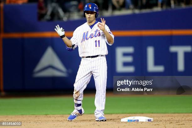 Norichika Aoki of the New York Mets reacts after hitting a go ahead double in the sixth inning to score Juan Lagares of the New York Mets against the...