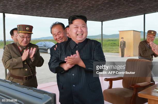 This undated picture released from North Korea's official Korean Central News Agency on September 16, 2017 shows North Korean leader Kim Jong-Un...