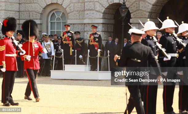 Troops parade in front of the outgoing Chief of Defence Staff General Sir David Richards , after a career of more than 40 years, formally hands over...