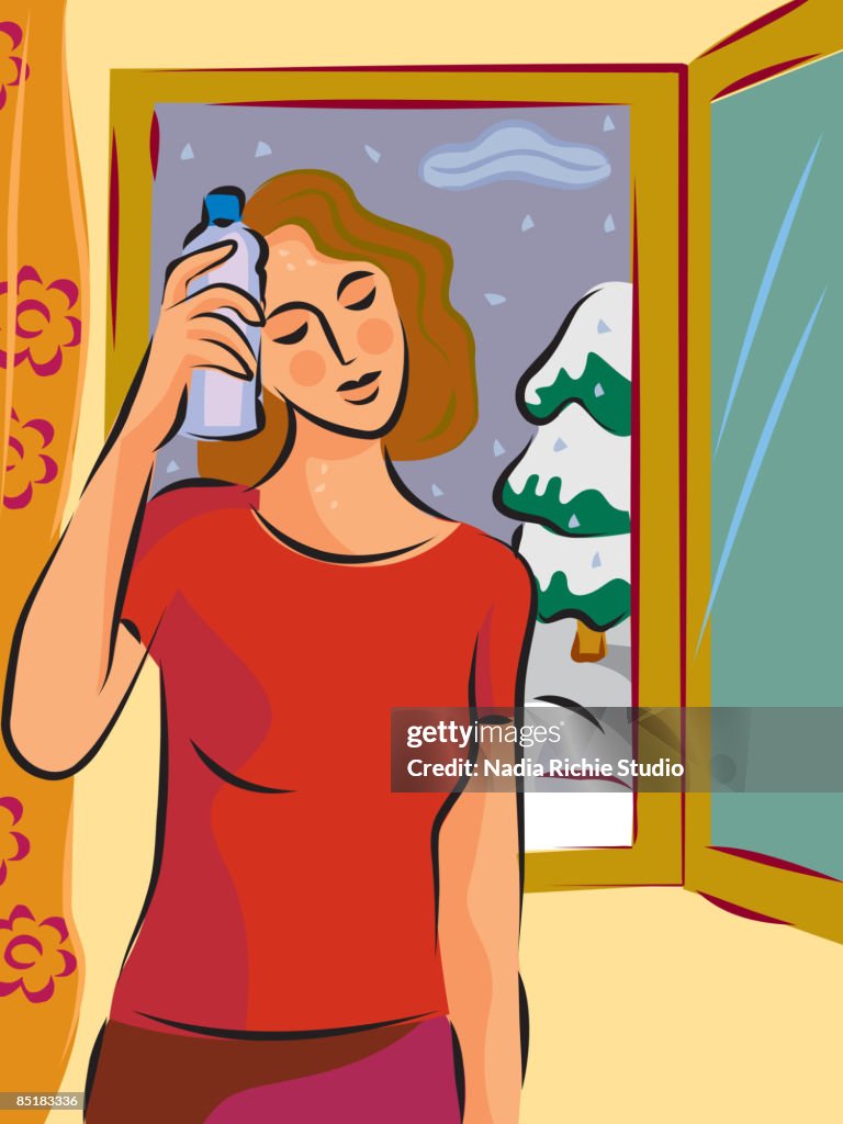 A hot and sweaty woman holding a cold bottle to her head in front of a window with snow outside