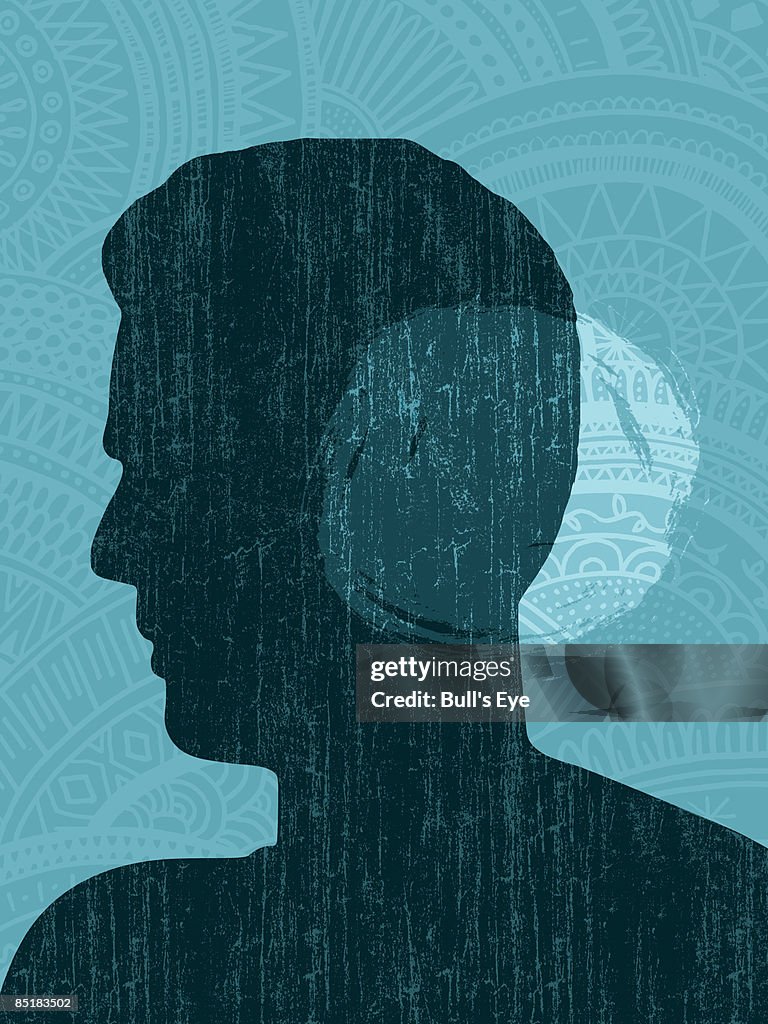 Profile of a man with a spotlight on his ear