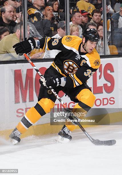 Zdeno Chara of the Boston Bruins skates with the puck against the Washington Capitals at the TD Banknorth Garden on February 28, 2009 in Boston,...