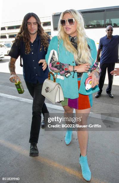 Kesha and Brad Ashenfelter are seen on September 22, 2017 in Los Angeles, California.