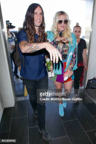 Kesha and Brad Ashenfelter are seen on September 22, 2017 in Los Angeles, California.