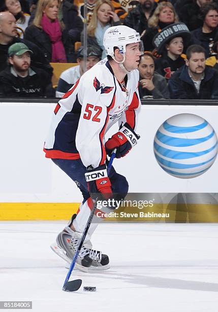 Mike Green of the Washington Capitals skates with the puck against the Boston Bruins at the TD Banknorth Garden on February 28, 2009 in Boston,...