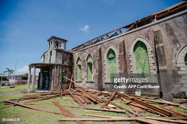 The destoyed Anglican Church of St. George is seen September 22, 2017 in Roseau, capital of the Caribbean island of Dominica, four days after the...