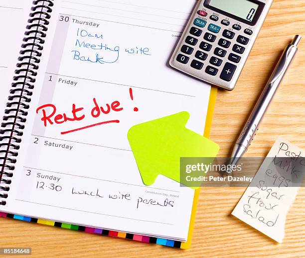 rent due deadline in diary - home finances stock pictures, royalty-free photos & images