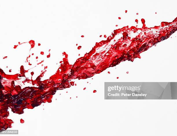 spilt red wine - wine splashing stock pictures, royalty-free photos & images