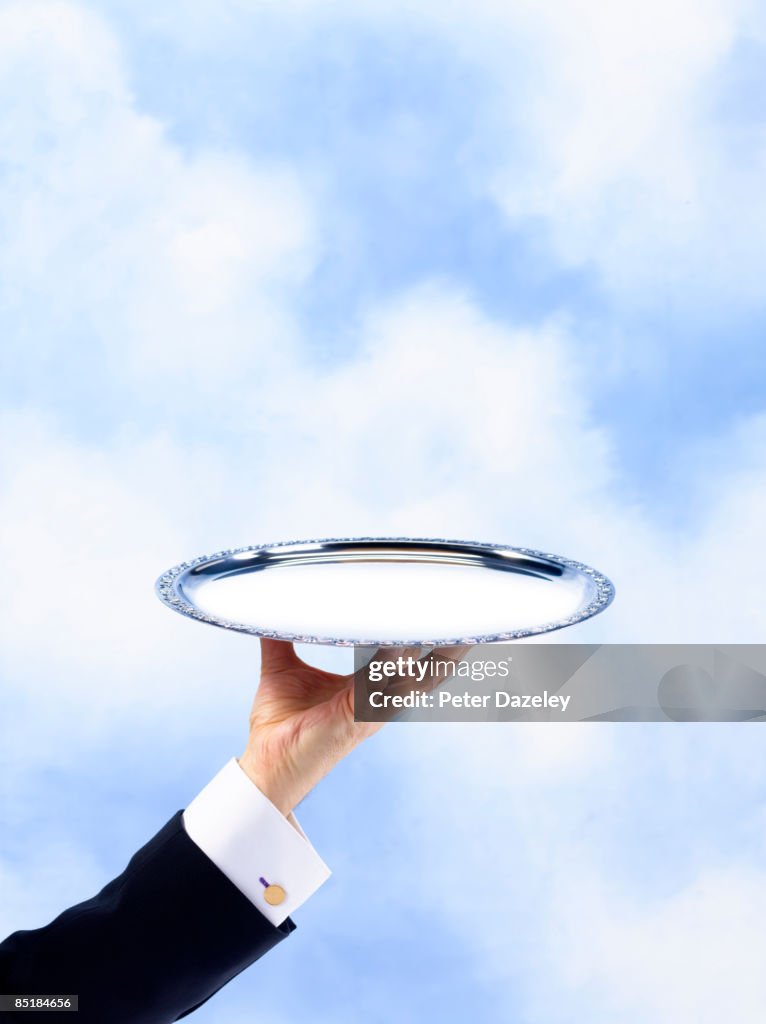Butler with invitation on silver salver