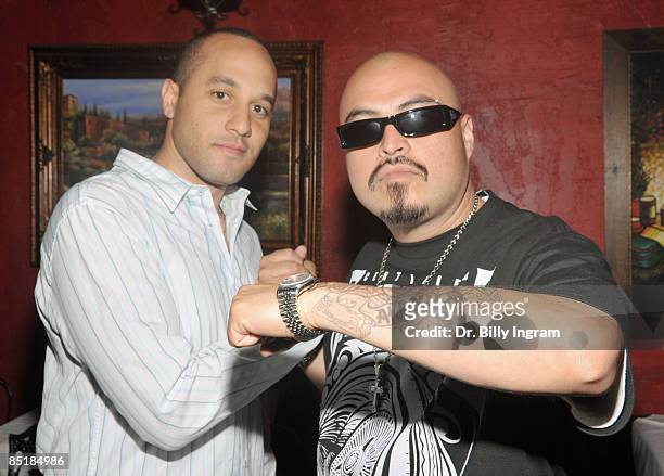 Chris Bythewood and hip hop artist/executive director Down A.K.A. Kilo attend the "Lean Like A Cholo" Wrap Party at Pueblo Viejo on March 2, 2009 in...