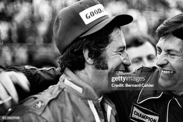 Mario Andretti, Tony Southgate, Lotus-Ford 77, Grand Prix of Japan, Fuji Speedway, 24 October 1976. Mario Andretti celebrating victory with Lotus...
