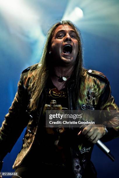 Photo of Andi DERIS and HELLOWEEN, Andi Deris performing on stage