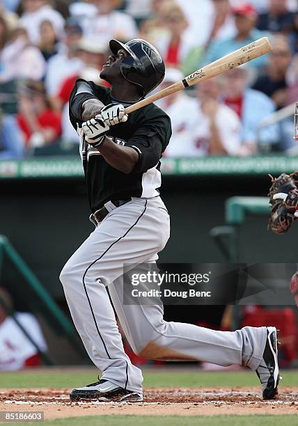 Cameron Maybin of the Florida Marlins bats against the St. Louis Cardinals during a spring training game at Roger Dean Stadium on February 25, 2009...