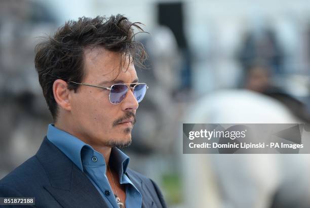 Johnny Depp arriving at the UK Premiere of The Lone Ranger, at the Odeon West End cinema in London.