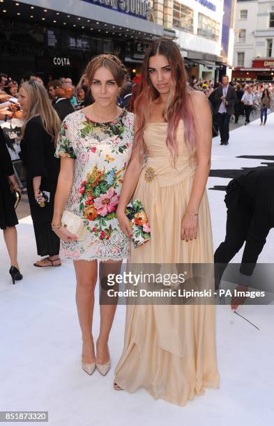 Amber Le Bon and guest arriving at the UK Premiere of The Lone Ranger, at the Odeon West End cinema in London.