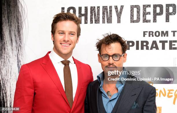 Armie Hammer and Johnny Depp arriving at the UK Premiere of The Lone Ranger, at the Odeon West End cinema in London.