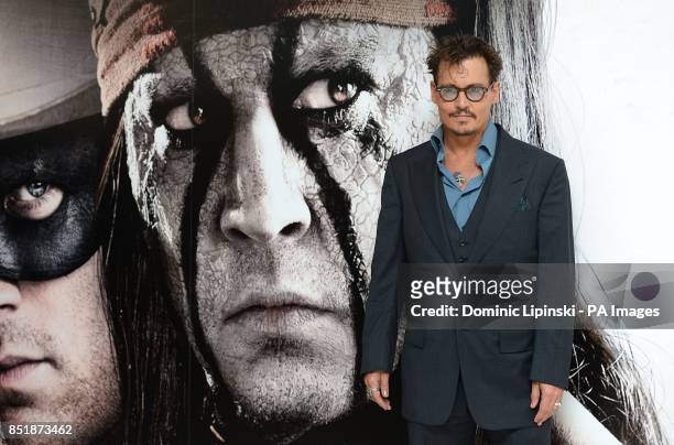 Johnny Depp arriving at the UK Premiere of The Lone Ranger, at the Odeon West End cinema in London.