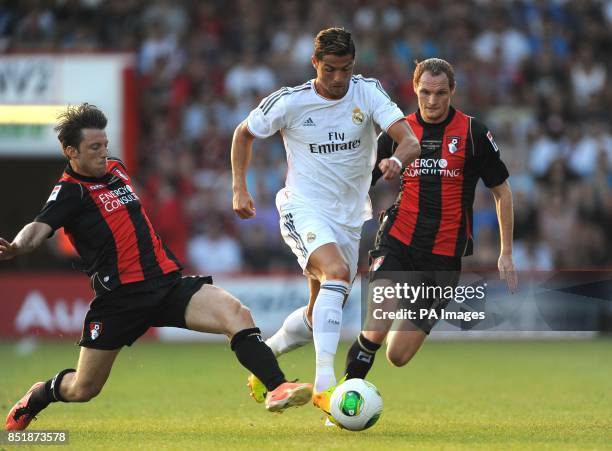 Bournemouth's Harry Arter tackles Real Madrid's Cristiano Ronaldo during the pre-season friendly at the Goldsands Stadium, Bournemouth.