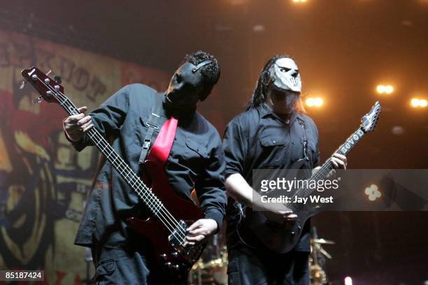 Bass player Paul Gray and Guitar player Mick Thompson of Slipknot perform in concert at The Freeman Coliseum on March 1, 2009 in San Antonio, Texas.
