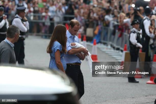 The Duke and Duchess of Cambridge leave the Lindo Wing of St Mary's Hospital in London, with their newborn son, Prince George of Cambridge.