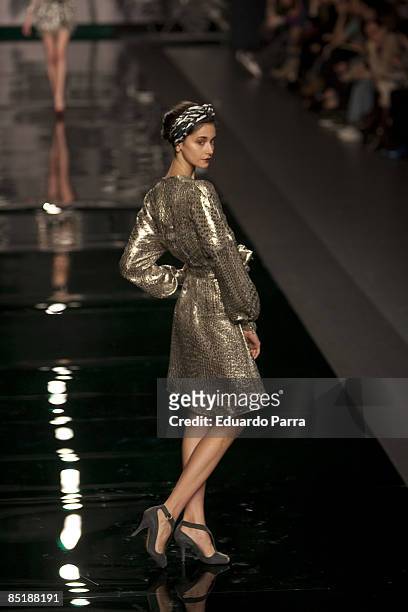 Model walks the runway in the Carmen March fashion show during Cibeles Madrid Fashion Week A/W 2009 at the IFEMA on February, 22 2009 in Madrid,...