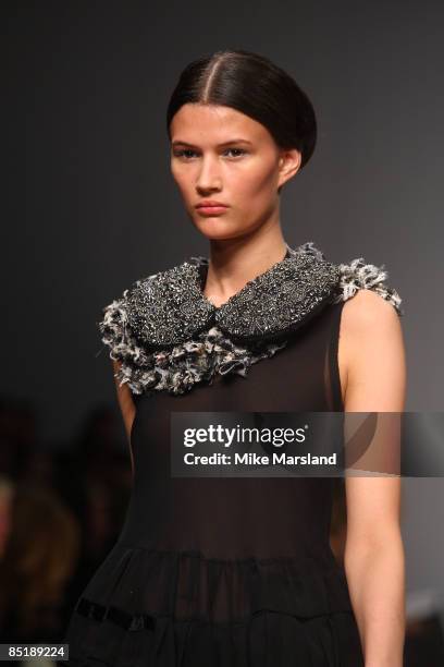 Model walks the runway at the John Rocha show at London Fashion Week Autumn/Winter 2009 at Natural History Museum on February 21, 2009 in London,...