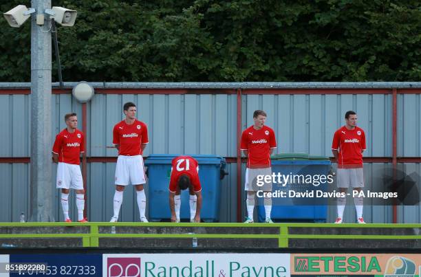 Cardiff City's Craig Noone , Mark Hudson , Simon Lappin , Joe Mason and Don Cowie warm-up in the stands