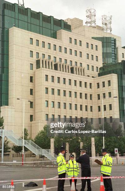 Large area around the the British Intelligence MI6 headquarters building is cordoned off September 21, 2000 by London Metropolitan police in London,...