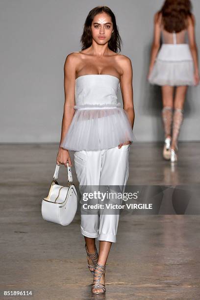 Model walks the runway at the Genny Ready to Wear Spring/Summer 2018 fashion show during Milan Fashion Week Spring/Summer 2018 on September 21, 2017...