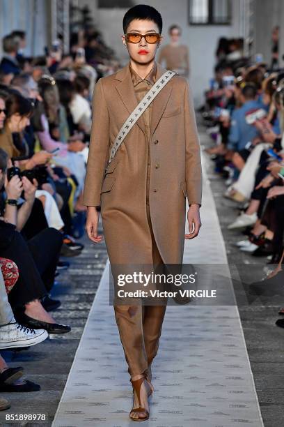 Model walks the runway at the Max Mara Ready to Wear Spring/Summer 2018 fashion show during Milan Fashion Week Spring/Summer 2018 on September 21,...