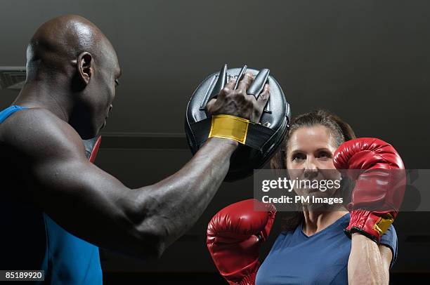 mature woman boxing - little falls new jersey foto e immagini stock