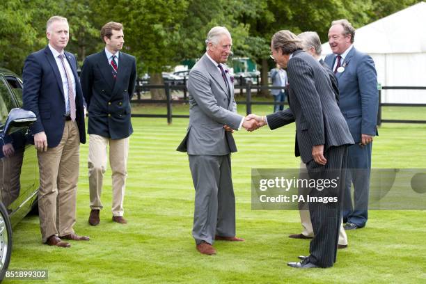 The Prince of Wales meets Brigadier John Wright, Chairman of the Hurlingham Polo Association, at the Audi International Polo featuring the...