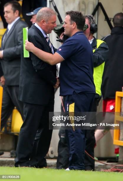 Rangers manager Ally McCoist shakes hands with Albion Rovers manager James Ward after the Ramsdens Challenge Cup, First Round South-West match at the...