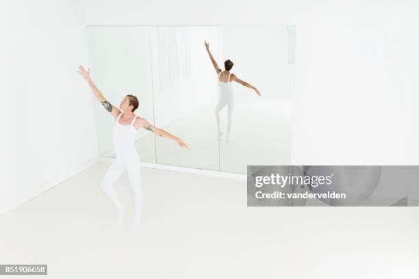 fair-haired male ballet dancer - full length mirror stock pictures, royalty-free photos & images