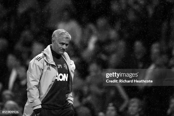 Jose Mourinho walks down the touchline during the Carabao Cup Third Round match between Manchester United and Burton Albion at Old Trafford on...