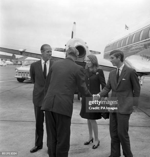 Handshake for Prince Charles, The Prince of Wales, as, along with with Prince Philip, The Duke of Edinburgh, and Princess Anne, is greeted at...