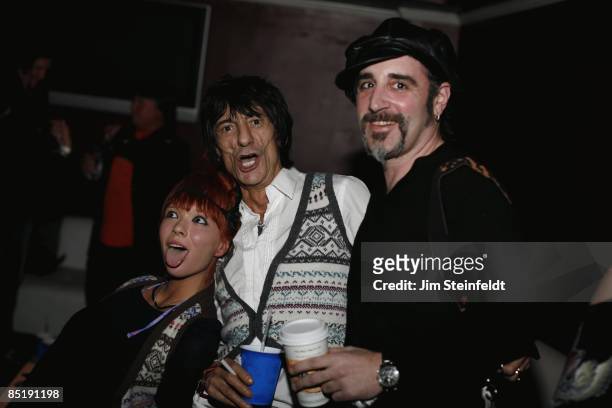 Ronnie Wood of the Rolling Stones with his girlfriend Ekaterina Ivanova and record producer Danny Saber hang out backstage at Joe's Joint in Los...