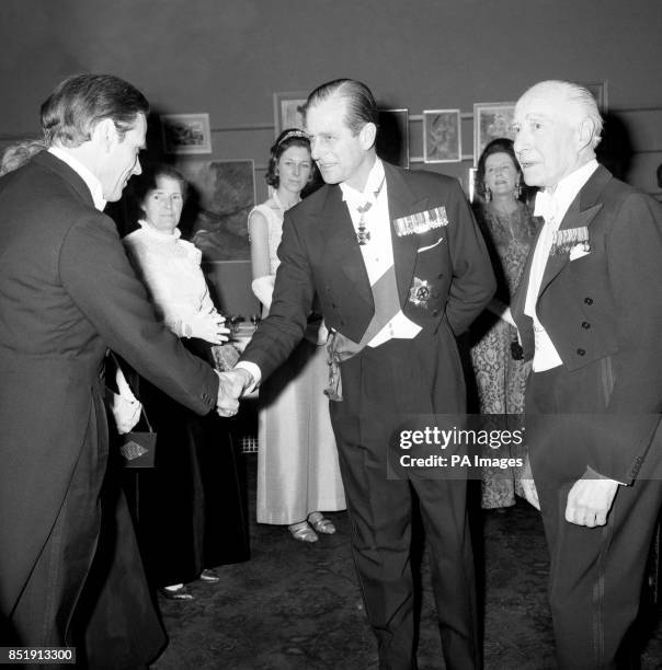 Prince Philip, The Duke of Edinburgh and patron of the British Council for Rehabilitation of the disabled, greets Lord Balneil, one of the speakers,...