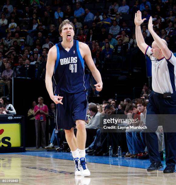 Dirk Nowitzki of the Dallas Mavericks reacts to making a three-pointer late in the game against the Oklahoma City Thunder on March 2, 2009 at the...