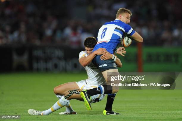 Bath Rugby 7's Max Northcote-Green is tackled by Worcester Warriors 7's Ben Howard during the Group A match of the J.P. Morgan Asset Management...