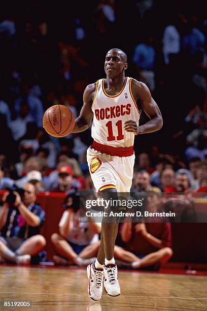 Vernon Maxwell of the Houston Rockets moves the ball up court against the Utah Jazz during Game Two of the Western Conference Finals played on May...