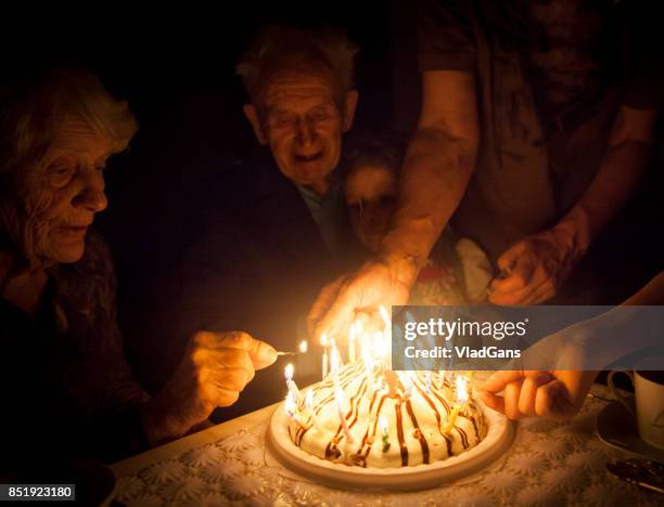 birthday party for great grandparent - birthday candle stock pictures, royalty-free photos & images
