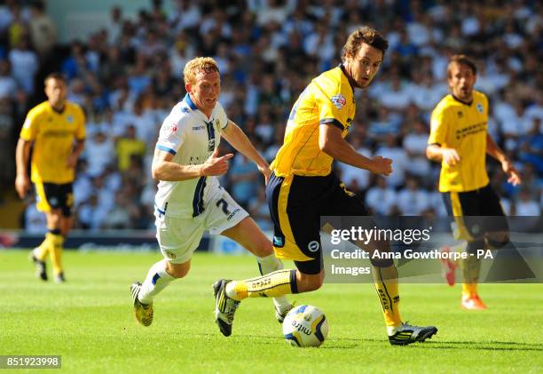 Leeds United's Paul Green and Brighton & Hove Albion's Will Buckley in action during the Sky Bet Championship match at Elland Road, Leeds.