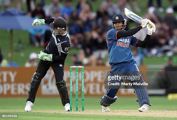 Brendon McCullum keeper for the Blackcaps injures his hand from a delivery past Yusuf Pathan of India during the first one day international match...