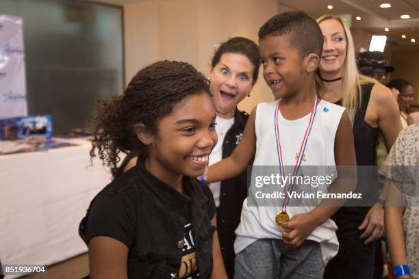 Tani Austin and Nita Strauss attends the Starkey Hearing Foundation Hearing Mission during Rock In Rio 2017 at JW Marriott Hotel on September 21,...