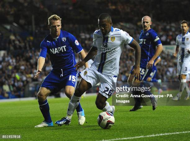 Chesterfield's Ritchie Humphreys and Leeds United's Dominic Poleon in action during the Capital One Cup, First Round match at Elland Road, Leeds.