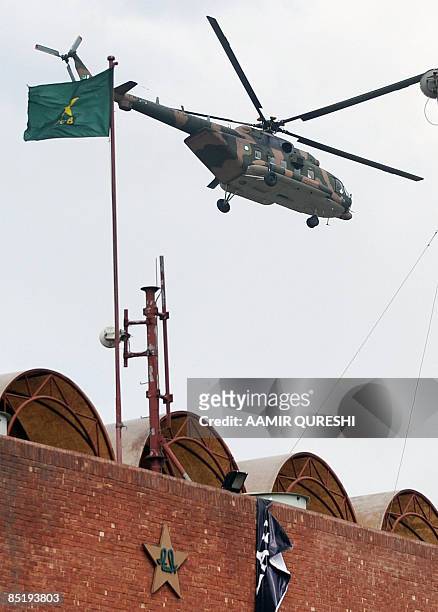 Pakistani army helicopter carrying Sri Lankan cricket team members takes off from The Gaddafi Stadium in Lahore on March 3, 2009. Pakistani air force...